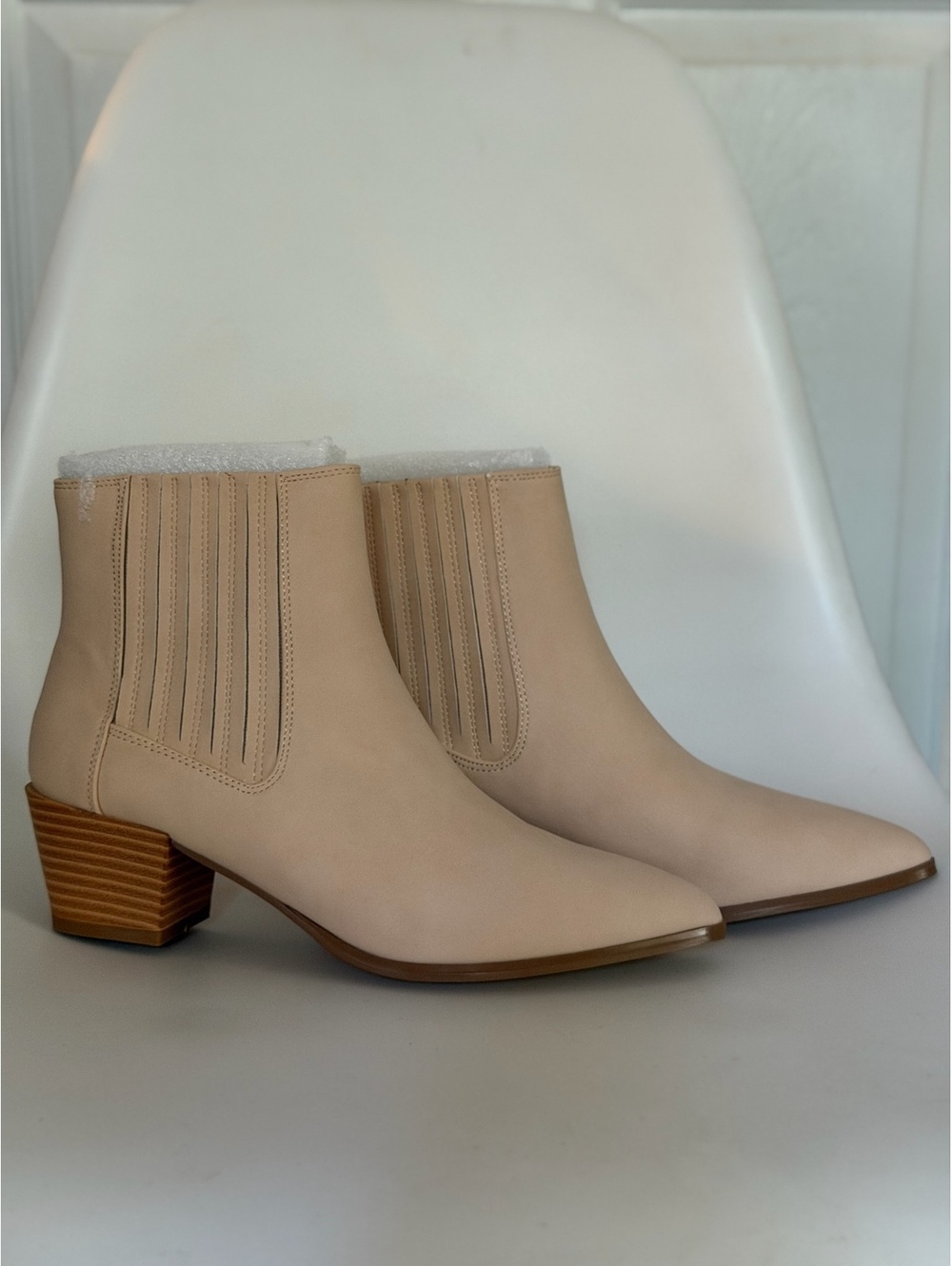 Beige pointed toe ankle boots